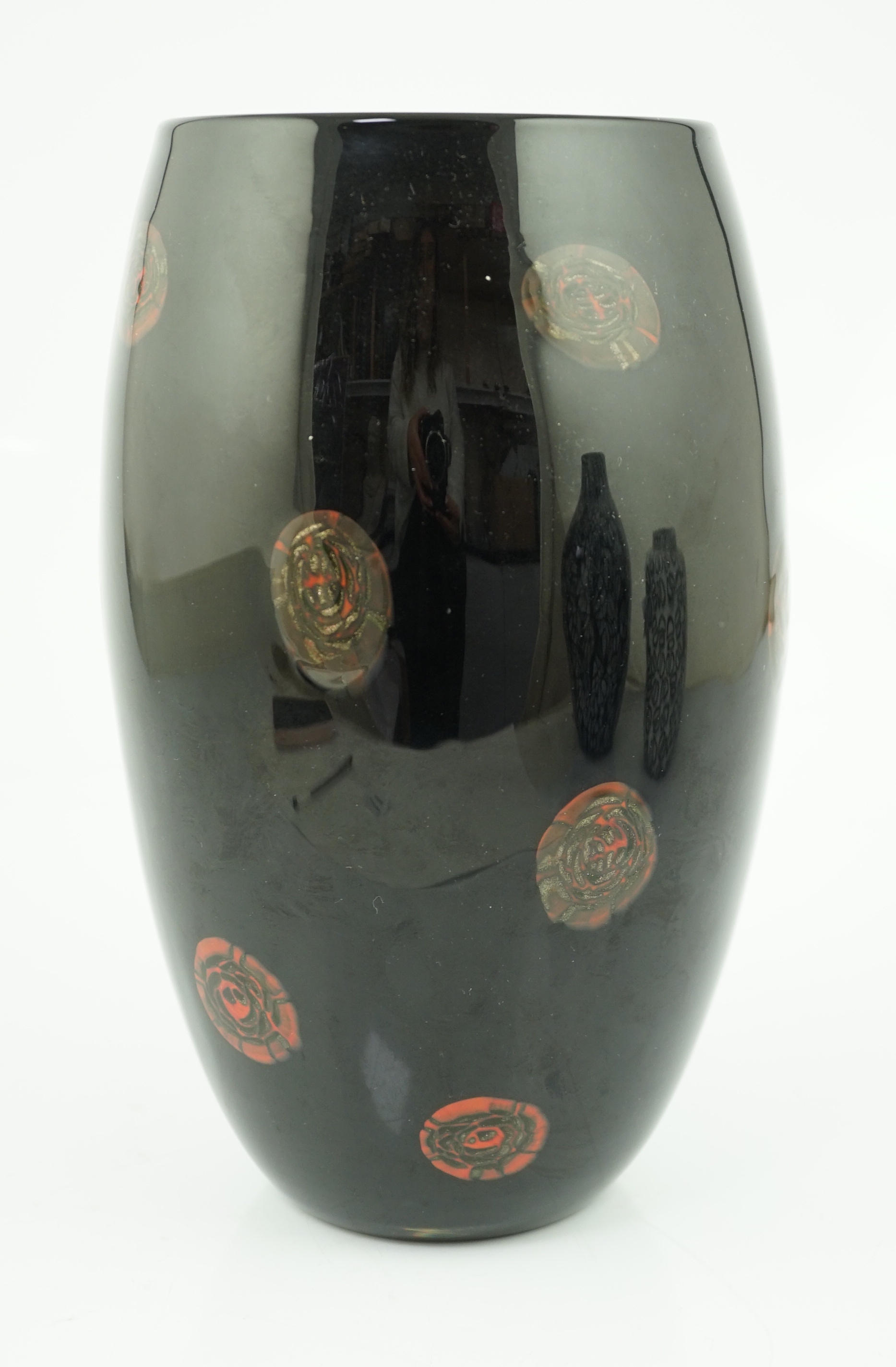 Vittorio Ferro (1932-2012) A Murano glass Murrine vase, with bronze roundels on a black ground, unsigned, 28cm, Please note this lot attracts an additional import tax of 20% on the hammer price